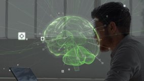 Male researcher leaning toward laptop in tech lab, interacting with glowing green holographic brain. Technology, innovation, visualization, futurism, scientific, digital, analysis - Powered by Shutterstock - Get 15% off with code: PIKWIZARD15