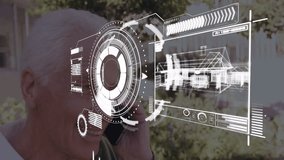 Senior man using smartphone outdoors interacting with HUD and real estate 3D blueprint overlay. Technology, innovation, futurism, architecture, visualization, outdoor, senior - Powered by Shutterstock - Get 15% off with code: PIKWIZARD15