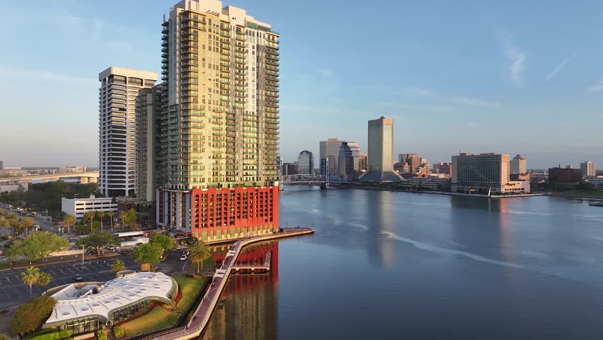 Cityscape aerial view from San Marco and downtown Jacksonville, Florida, on a beautiful blue-sky spring day, with the river, and tall buildings.