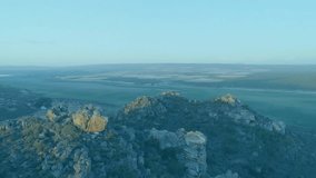 Finance bar chart being animated over mountains, showing yellow orange-red bars with labels. Mountains, infographic, data visualization, outdoor, landscape, elevation, growth - Powered by Shutterstock - Get 15% off with code: PIKWIZARD15