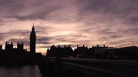 Translucent HUD overlay being animated over London sunset skyline, showing floating media icons. Cityscape, urban, sunset, skyline, digital, futuristic, technology - Powered by Shutterstock - Get 15% off with code: PIKWIZARD15