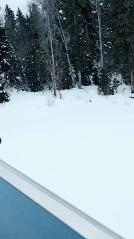 Young Man Skiing Down Snowy Slope — Winter Sports and Mountain Adventure
