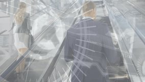 Business colleagues ascending escalator in atrium, showing smartphone data and floating graphics. Corporate, technology, modern, networking, professional, innovation, workspace - Powered by Shutterstock - Get 15% off with code: PIKWIZARD15