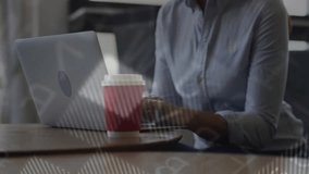 woman tapping smartphone, analyzing data on laptop at desk, with world map overlay and teal blocks. Technology, data, analytics, professional, digital, workspace, modern - Powered by Shutterstock - Get 15% off with code: PIKWIZARD15