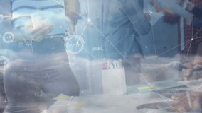 Student using tablet and team shaking hands in business office, showing digital graphs and notes. Technology, collaboration, innovation, networking, digital, teamwork, productivity - Powered by Shutterstock - Get 15% off with code: PIKWIZARD15