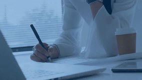 Business professional writing documents at office desk, featuring pen, laptop and network icons. Corporate, professionalism, technology, productivity, workspace, modern, executive - Powered by Shutterstock - Get 15% off with code: PIKWIZARD15