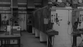 Digital world map overlay floating above industrial workshop featuring hex grid and data markers. Technology, manufacturing, industrial, analytics, connectivity, innovation, precision - Powered by Shutterstock - Get 15% off with code: PIKWIZARD15