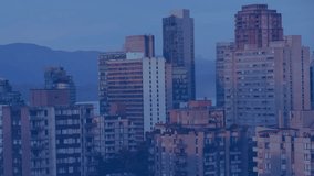 Urban skyline displaying dashboard overlay featuring equalizer bar, DNA helix icons, circular UI. Technology, innovation, data visualization, futuristic, smart city, digital interface, analytics - Powered by Shutterstock - Get 15% off with code: PIKWIZARD15