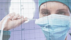 female surgeon scanning patient vitals in medical environment with surgical mask, grid plus symbols. Medical, healthcare, diagnostic, futuristic, clinical, technology, professional - Powered by Shutterstock - Get 15% off with code: PIKWIZARD15
