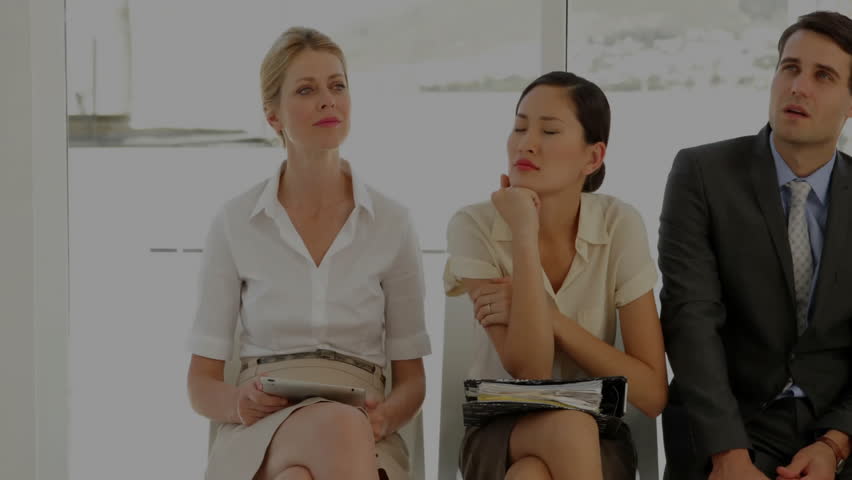 business team sitting in modern office, examining animated bar and line chart overlays. Corporate, teamwork, innovation, analytics, professional, conference, growth - Powered by Shutterstock - Get 15% off with code: PIKWIZARD15