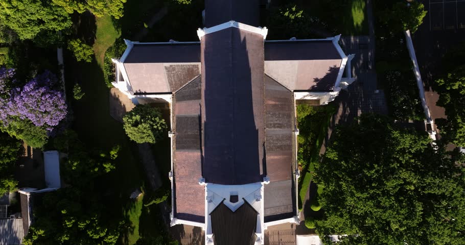 Drone Ascends Above Picturesque White Church with Steeple. Summer