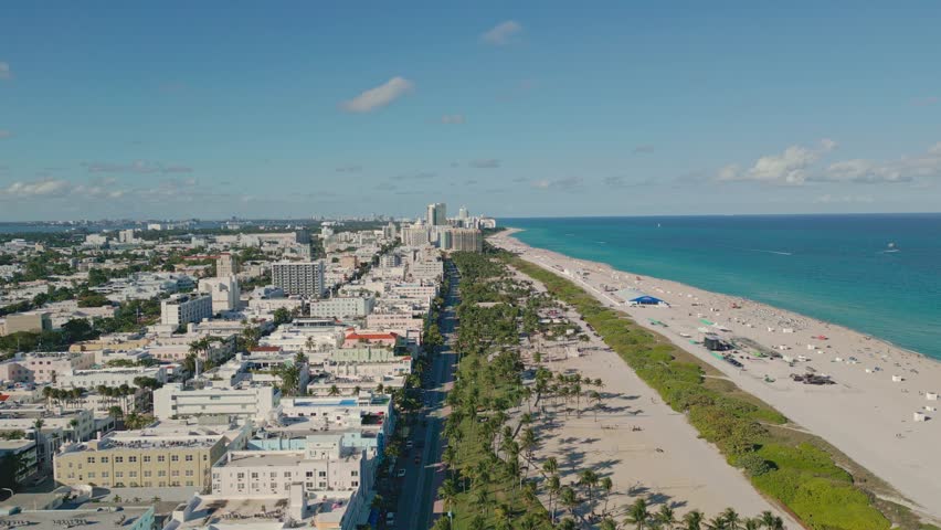 Drone view of The skyline of Miami. Miami Beach aerial view. South Beach, Miami Beach. Aerial view South Pointe Park in Miami Beach, Florida. American tourism in Florida.