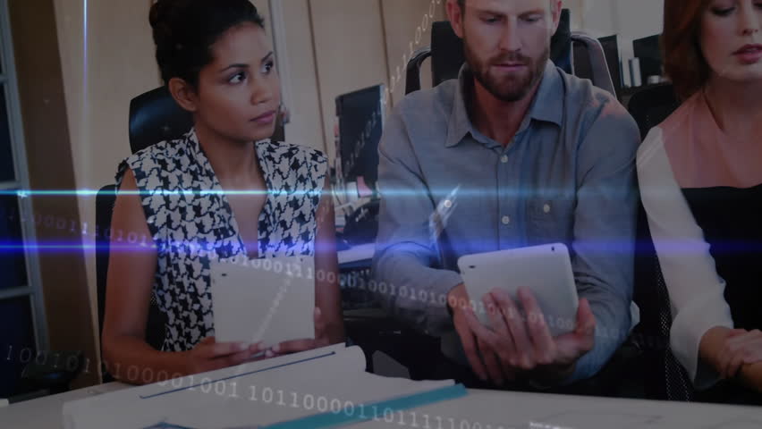 office workers collaborating at desk in tech office, featuring binary code and light flare overlays. Professional, teamwork, innovation, technology, modern, communication, productivity - Powered by Shutterstock - Get 15% off with code: PIKWIZARD15