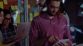 Team working in tech office, reviewing sticky notes, tablet, exploring holographic network graphic. Collaboration, innovation, digital, brainstorming, strategy, modernity, teamwork - Powered by Shutterstock - Get 15% off with code: PIKWIZARD15