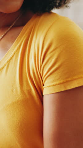 Hands, posture and shoulder pain with person on sofa in living room of home for injury or massage. Accident, joint and muscle fatigue with woman closeup in apartment for inflammation or recovery