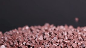 Chocolate chips cascading onto a pile - Powered by Shutterstock - Get 15% off with code: PIKWIZARD15