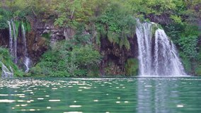 A calming waterfall for meditation. Waterfall magic in an untouched landscape. A stunning summer waterfall getaway. Reconnect with nature at a waterfall. - Powered by Shutterstock - Get 15% off with code: PIKWIZARD15