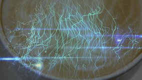 Animating neon-blue and green light trails over beige surface with white rim and blue flares. Abstract, luminescence, digital, modern, vibrant, futuristic, energy - Powered by Shutterstock - Get 15% off with code: PIKWIZARD15