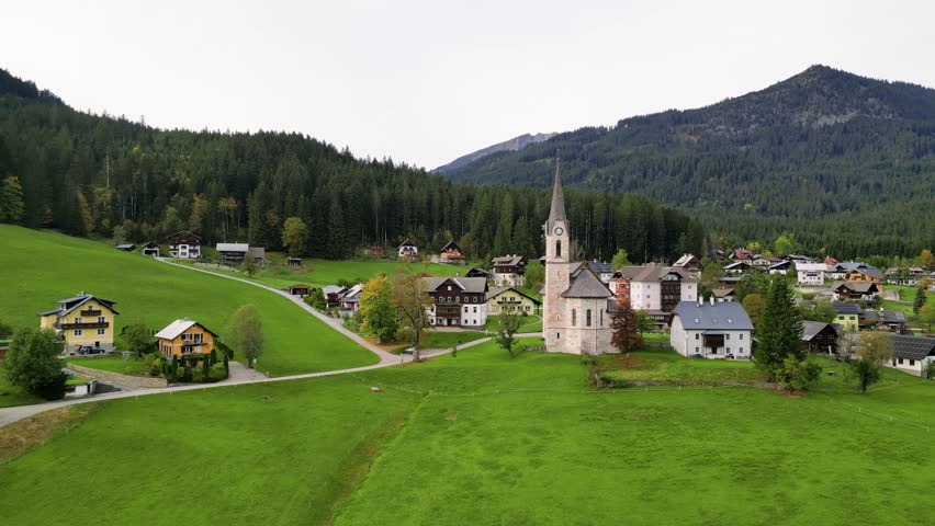 Aerial view of historic church in scenic Gosau village in Austria.