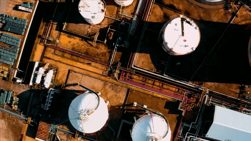Aerial View of Industrial Refinery Tanks and Pipelines