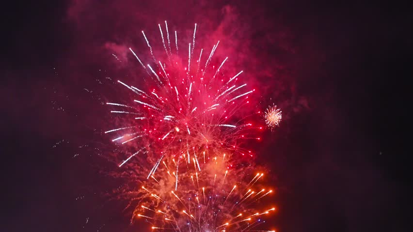 big beautiful colorful festive fireworks display at celebration of pyrotechnic show in the night sky