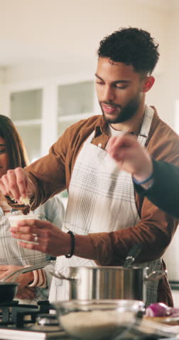 Couple, cooking class and chef in home with learning, teaching and smile for nutrition in kitchen. Man, people and coach for cheese, lesson and meal prep advice for diet, dinner or food in apartment