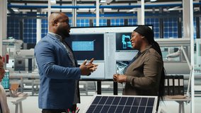 Photovoltaics factory manager meeting with investor to discuss business operations and growth plans. Solar panels plant management executive talking with shareholder, doing deal evaluation, camera A - Powered by Shutterstock - Get 15% off with code: PIKWIZARD15