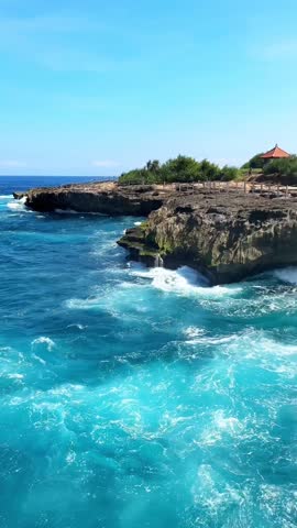 Rainbow Spray Over Cliff at Devil’s Tear, Bali 