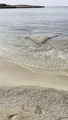 Mediterranean sea, waves are gently licking the beach. Peaceful and harmony. Cyprus. 