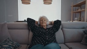 Beautiful senior old woman with gray hair at home - Youthful elderly granmother spending quality time at home. Listening to music with the headphones. - Powered by Shutterstock - Get 15% off with code: PIKWIZARD15
