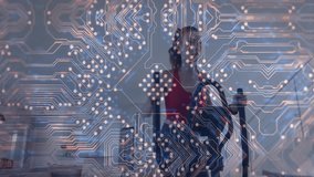 woman using elliptical machine inside home gym, showing fitness tech digital circuit board overlay. Fitness, technology, minimalism, vitality, health, innovation, empowerment - Powered by Shutterstock - Get 15% off with code: PIKWIZARD15