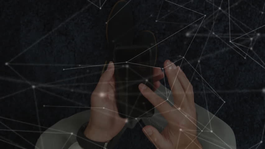 Man holding smartphone on dark carpet wearing fitness band, showing technology network mesh overlay. Technology, connectivity, digital, innovation, biometric, modern, responsive
