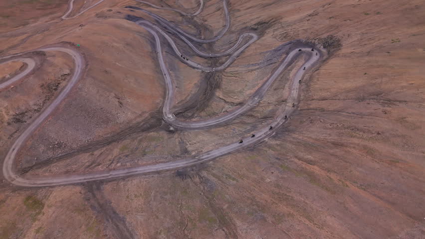 Bikers Riding Mountain Road in Himalayas