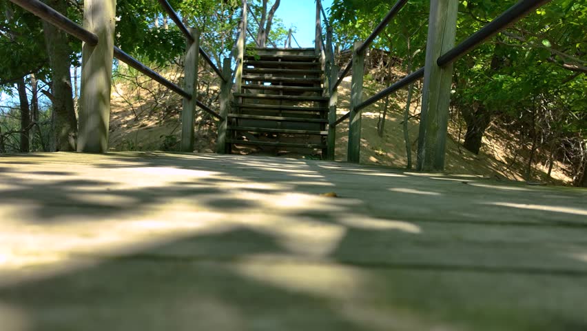 An old wooden walkway in the dunes.