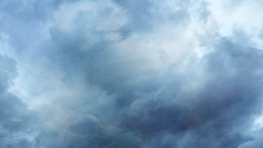 cloudy sky with storm clouds and passing wispy clouds of a heavy thunderstorm