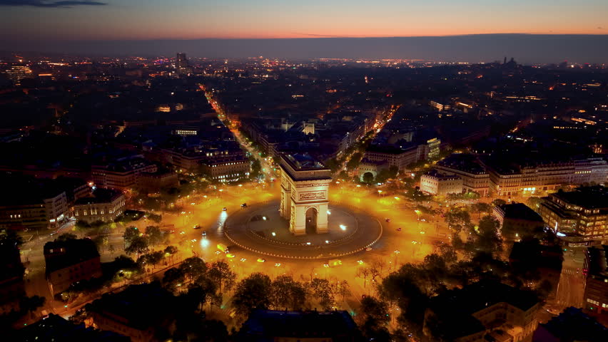 Stunning Aerial View of the Iconic Arc de Triomphe Monument at Beautiful Sunset Time. 4k. France