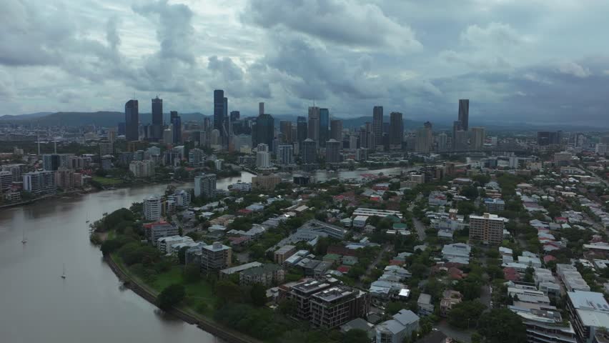 Brissy Brisbane City River Quay Citycat ferry boats Australia aerial drone South Bank Park Skyline skyscraper cranes morning sun rainy clouds Aussie summer autumn winter circle left motion