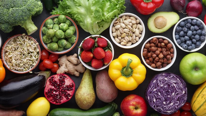 Healthy eating ingredients: fresh vegetables, fruits and superfood. Nutrition, diet, vegan food concept.