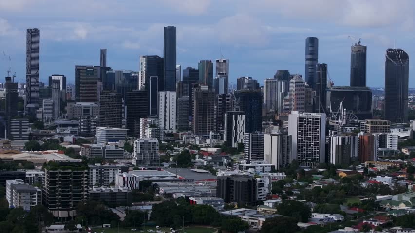 Brissy Brisbane City River Australia aerial drone South Bank Park Quay ferry boats Skyline skyscraper cranes Glass House Mountains grey cloudy morning summer autumn winter Aussie backwards motion