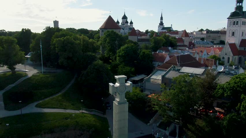 A drone shot of a victory monument at Freedom square in Tallinn Estonia, located in Europe Baltics. The monuments is located in beautiful old town with medieval buildings around. Vabaduse väljak.