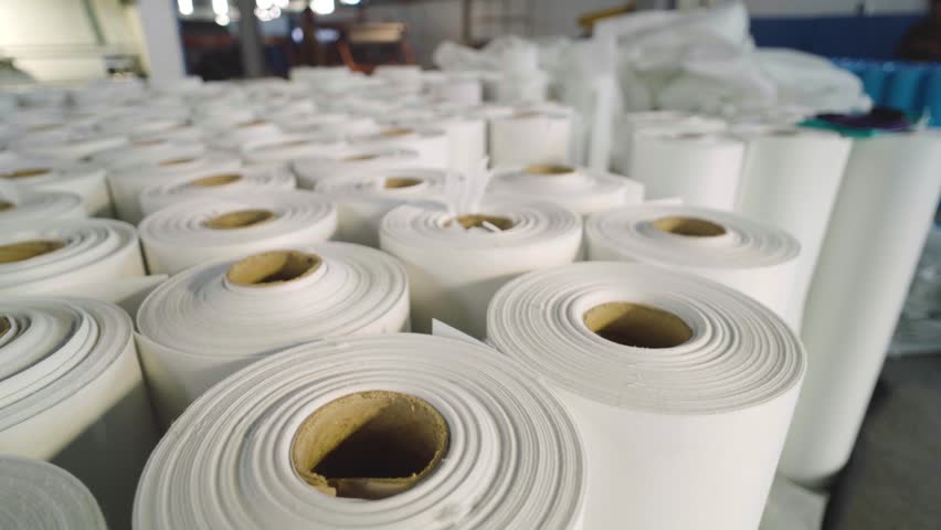 collection of Bolts of paper and cloth after being manufactured in the textile industry in Pakistan 
