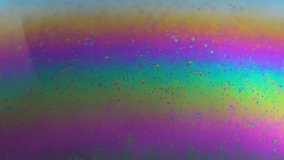 Rotating abstract multicolor soap bubble texture. Macro. Slow motion. Planet in science fiction universe. - Powered by Shutterstock - Get 15% off with code: PIKWIZARD15