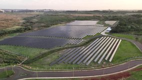 Aerial view of landscape with solar energy station. solar photovoltaic cell. Renewable energy. Argentina, Posadas, Misiones. 4k. - Powered by Shutterstock - Get 15% off with code: PIKWIZARD15