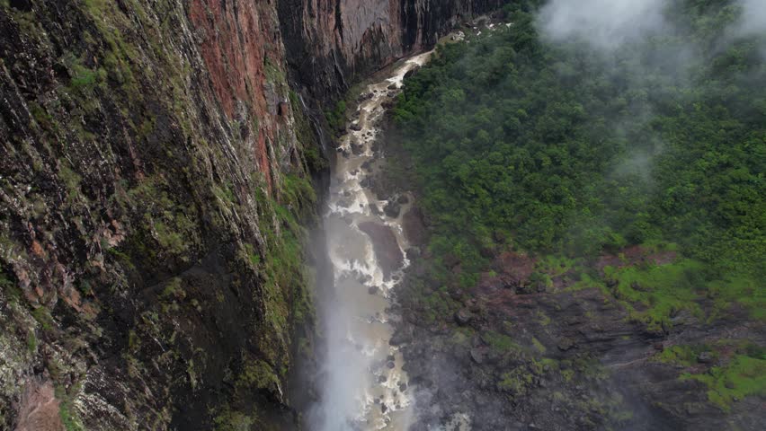 Aerial View of Stony Creek Under Wallaman Falls and Steep Cliffs, Queensland, Australia
