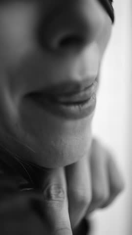 vertical video. Young woman wearing a cat mask. costumes for erotic games. feminine attractiveness. close-up