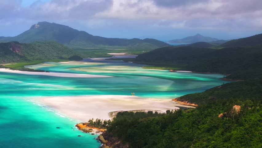 Whitsundays Islands Whitehaven Beach North end Hill Inlet Lookout aerial drone picturesque sandy National Park scenic flight view sunny clouds moving summer clear blue waters parallax circle right
