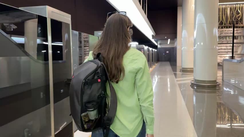 Girl Walking in subway platform Video