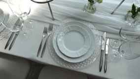 a table setting in a restaurant with a plate, fork, and knife - Powered by Shutterstock - Get 15% off with code: PIKWIZARD15
