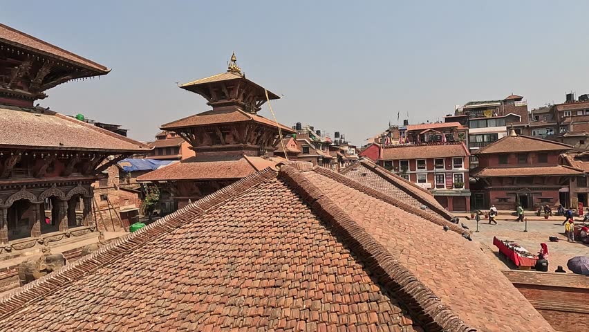 View over the temple roof tiles of Patan Darbar Square. Lalitpur in Kathmandu Valley, Nepal. Krishna Mandir, Bhimsen, Char Narayan, Pyamha Narandya