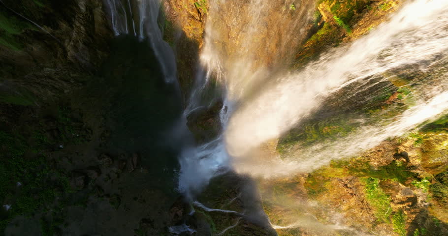 Large Waterfall At Lower Lakes In Plitvice Lakes National Park, Croatia. ascending pullback, drone shot